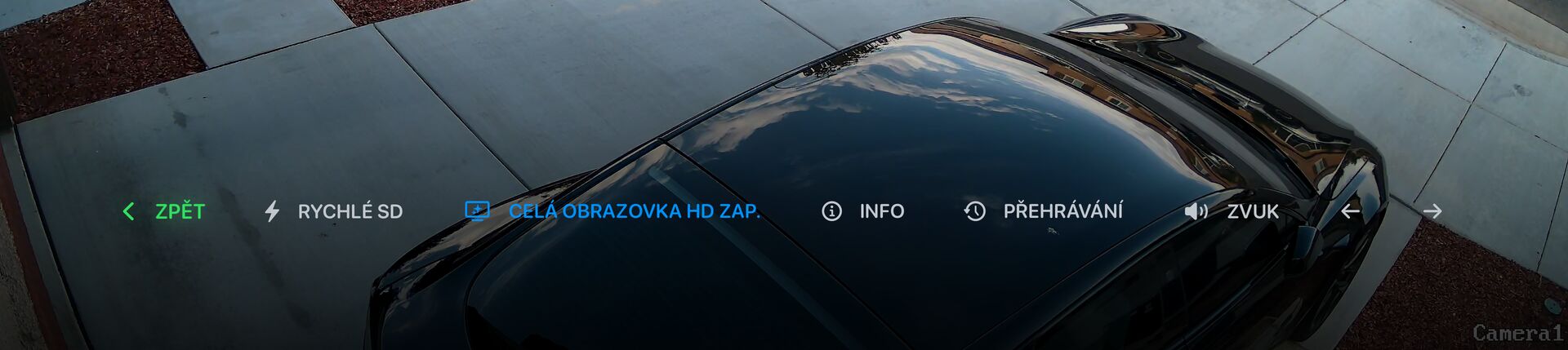 Ovládací lišta živého náhledu: Zpět, Rychlé SD, HD na celou obrazovku, Informace, Přehrávání, zvuk a šipky pro předchozí a následující kameru.